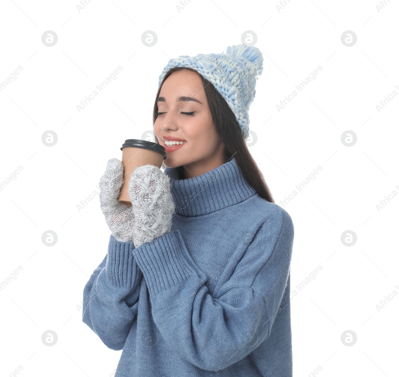 Photo of Happy beautiful woman with paper cup of mulled wine on white background