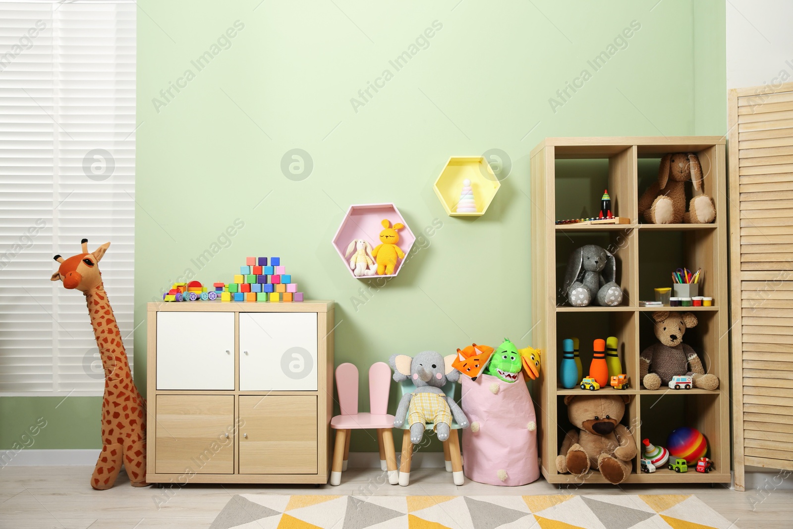 Photo of Child's room interior with many different toys