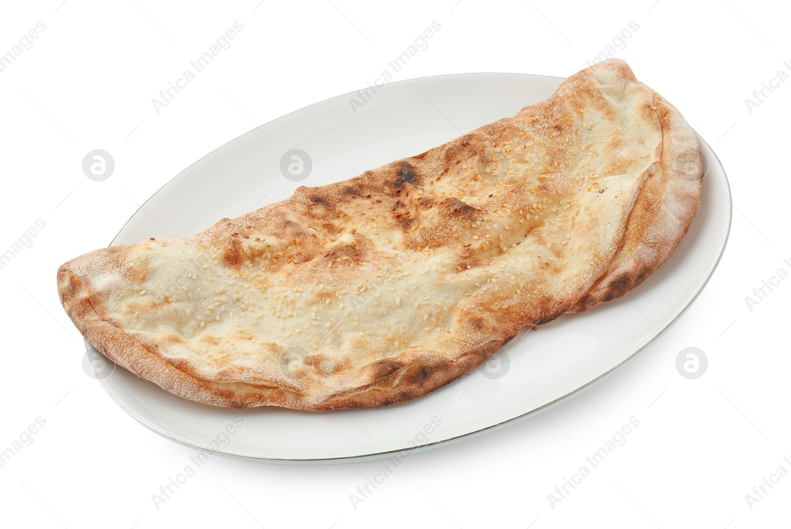 Photo of One delicious stuffed calzone isolated on white