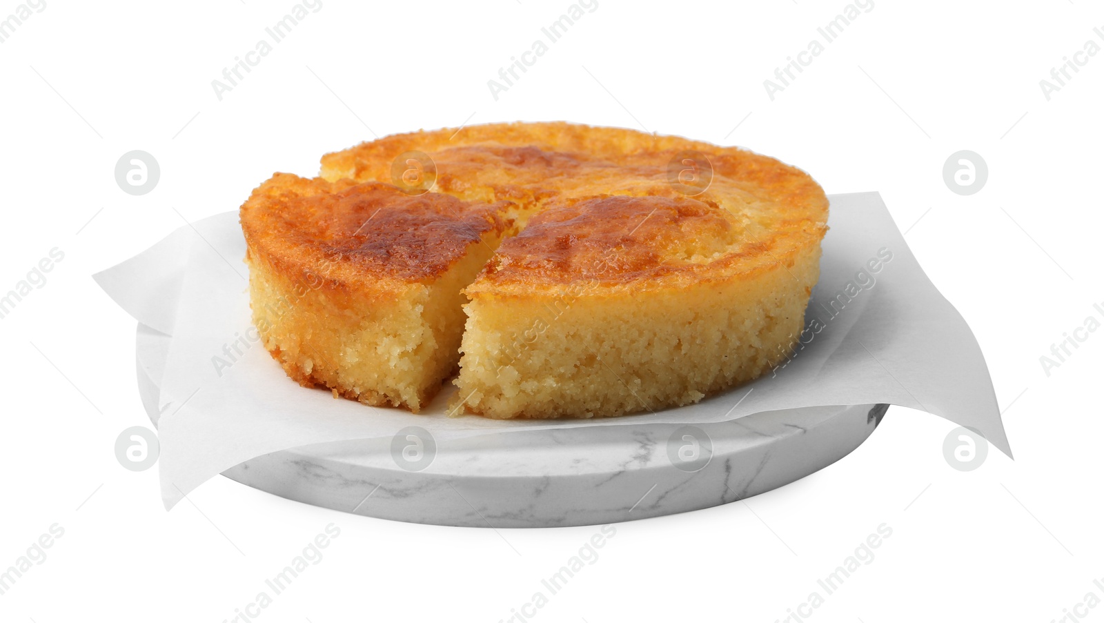 Photo of Tasty homemade semolina cake isolated on white