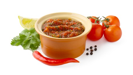 Photo of Tasty salsa sauce and ingredients isolated on white