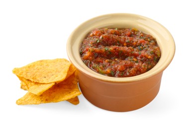 Photo of Tasty salsa sauce in bowl and tortilla chips isolated on white