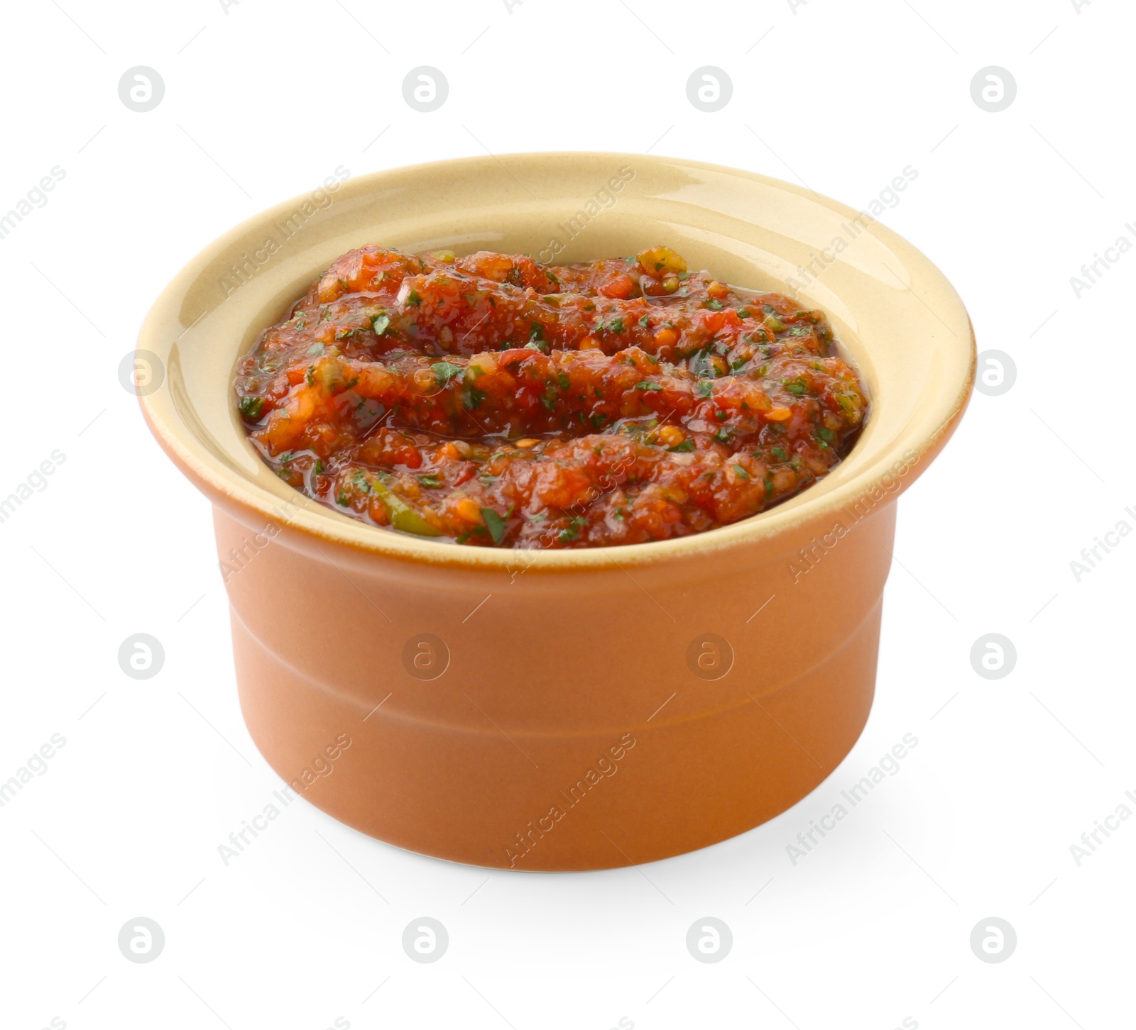 Photo of Tasty salsa sauce in bowl isolated on white