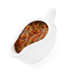 Photo of Tasty salsa sauce in gravy boat isolated on white