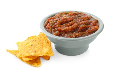 Photo of Tasty salsa sauce in bowl and tortilla chips isolated on white