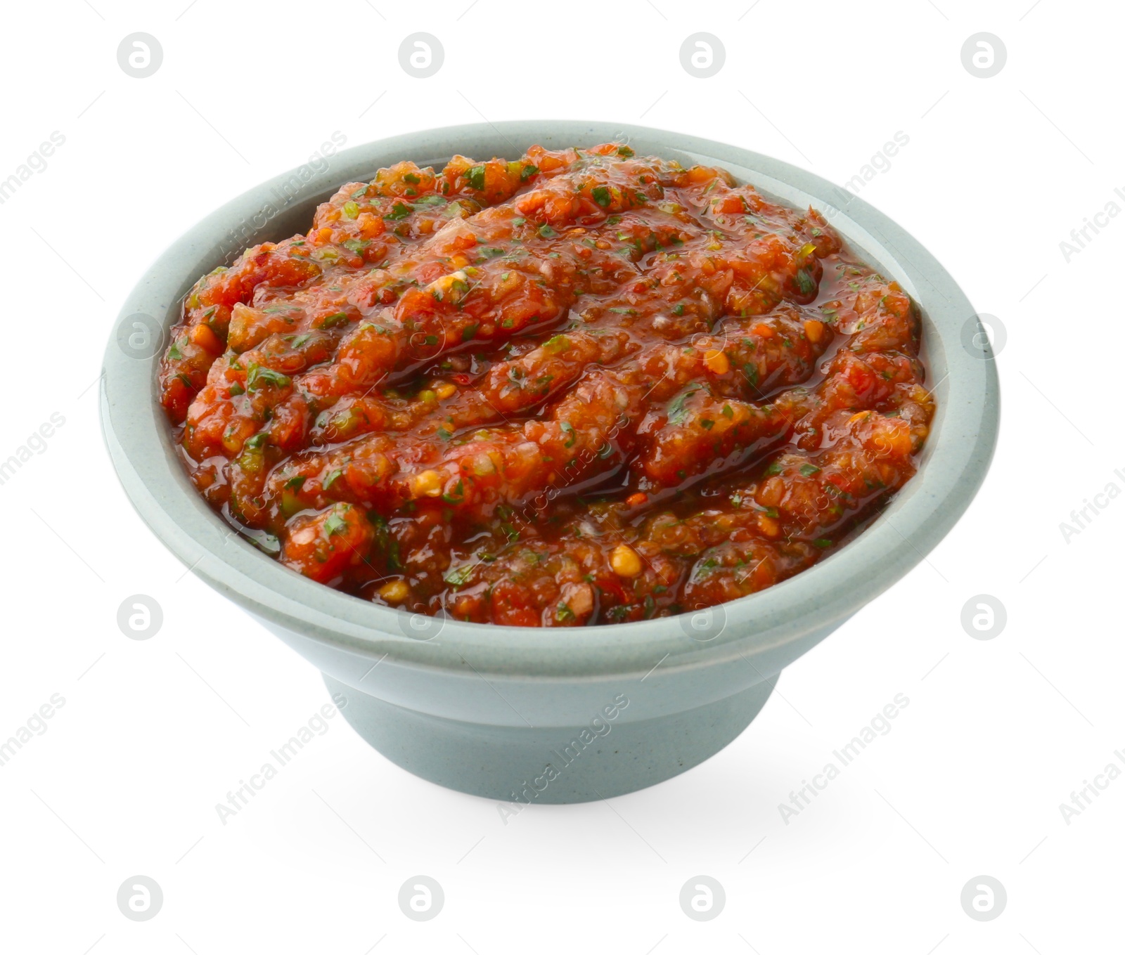 Photo of Tasty salsa sauce in bowl isolated on white