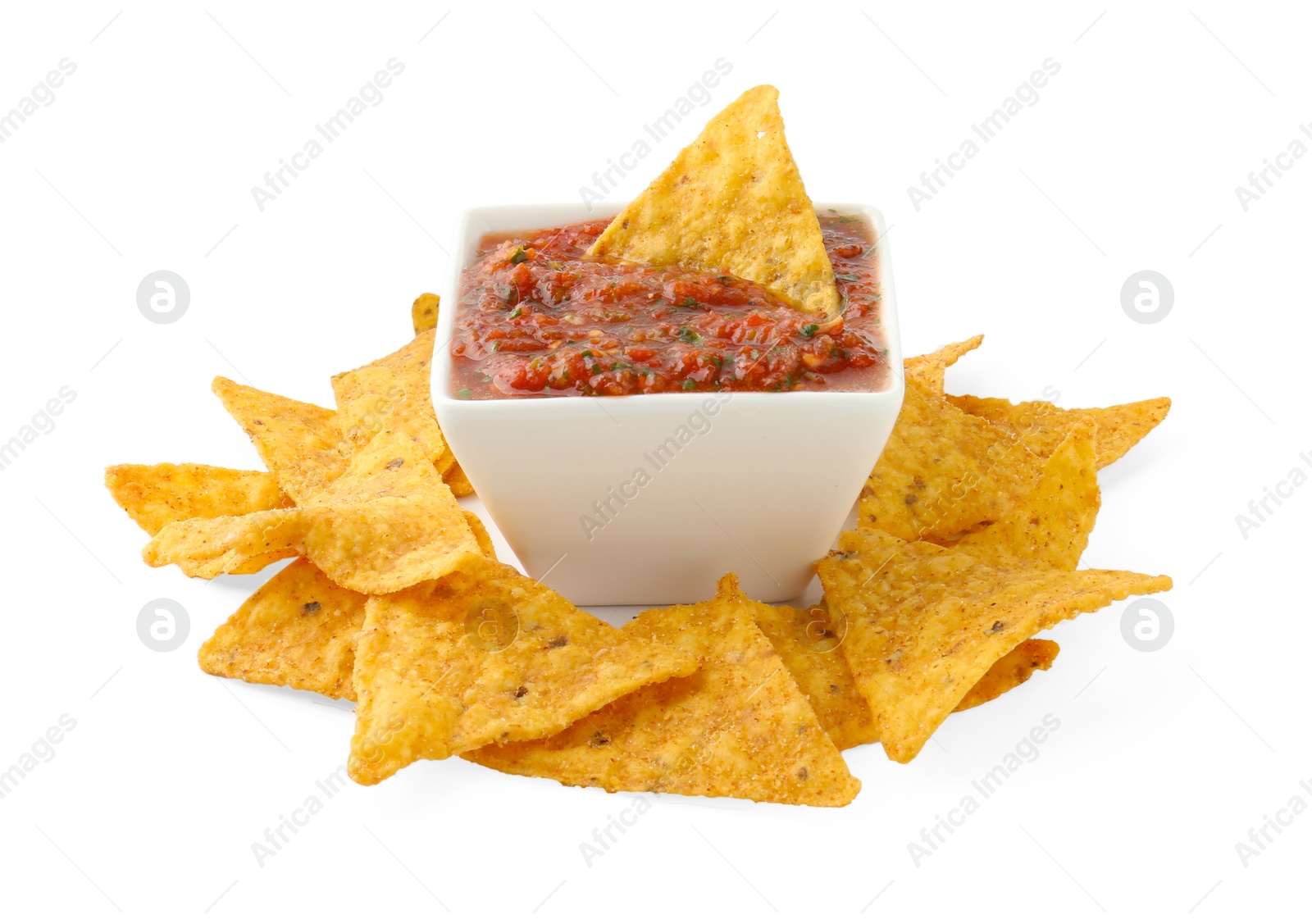 Photo of Tasty salsa sauce in bowl and tortilla chips isolated on white