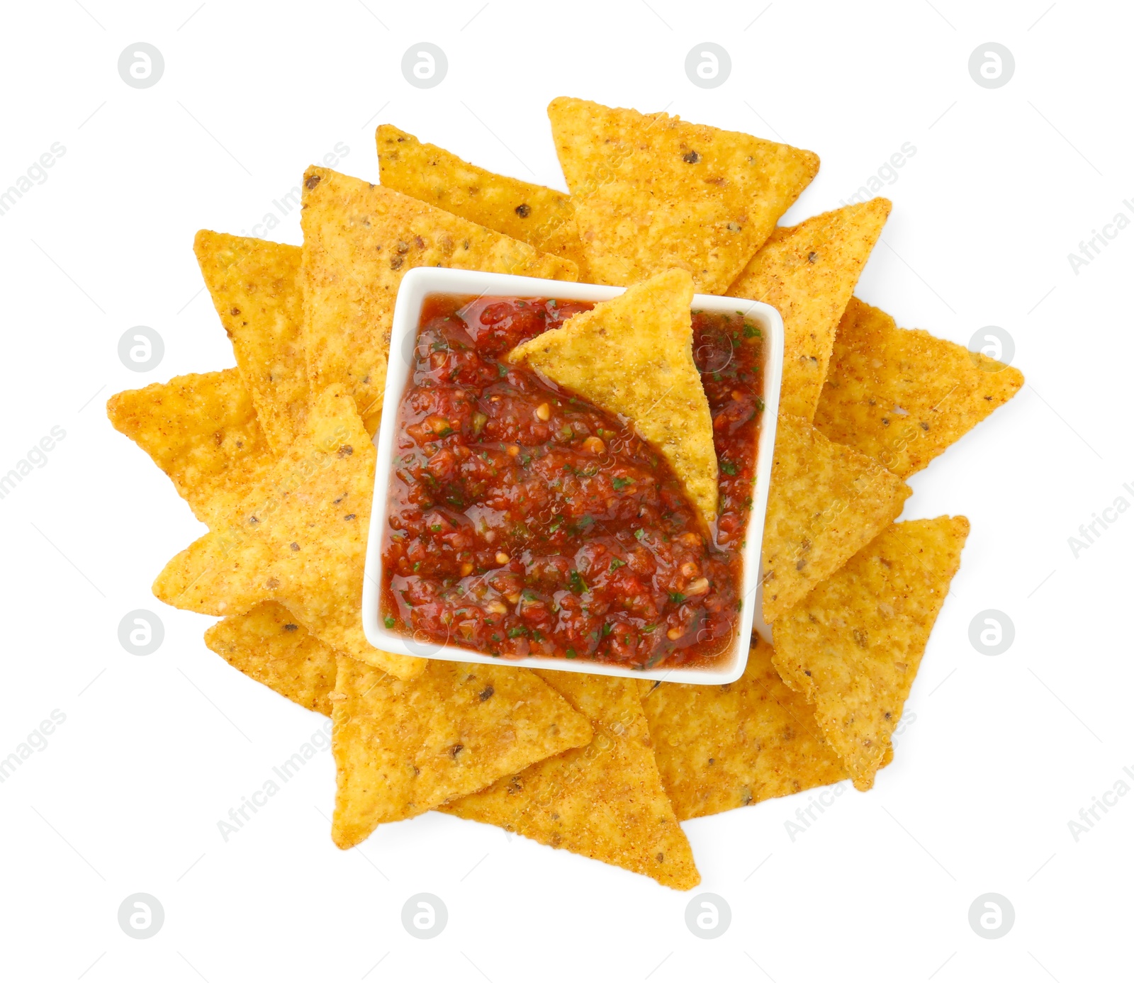 Photo of Tasty salsa sauce in bowl and tortilla chips isolated on white, top view