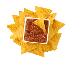 Photo of Tasty salsa sauce in bowl and tortilla chips isolated on white, top view