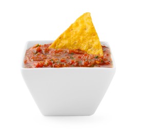 Photo of Tasty salsa sauce in bowl and tortilla chip isolated on white