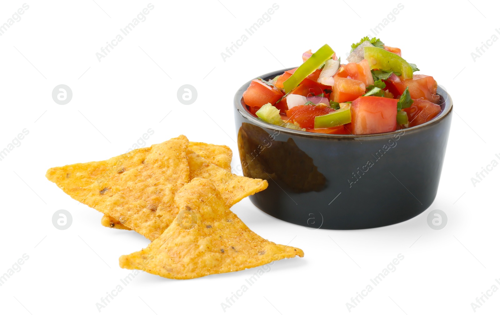 Photo of Tasty salsa sauce in bowl and tortilla chips isolated on white