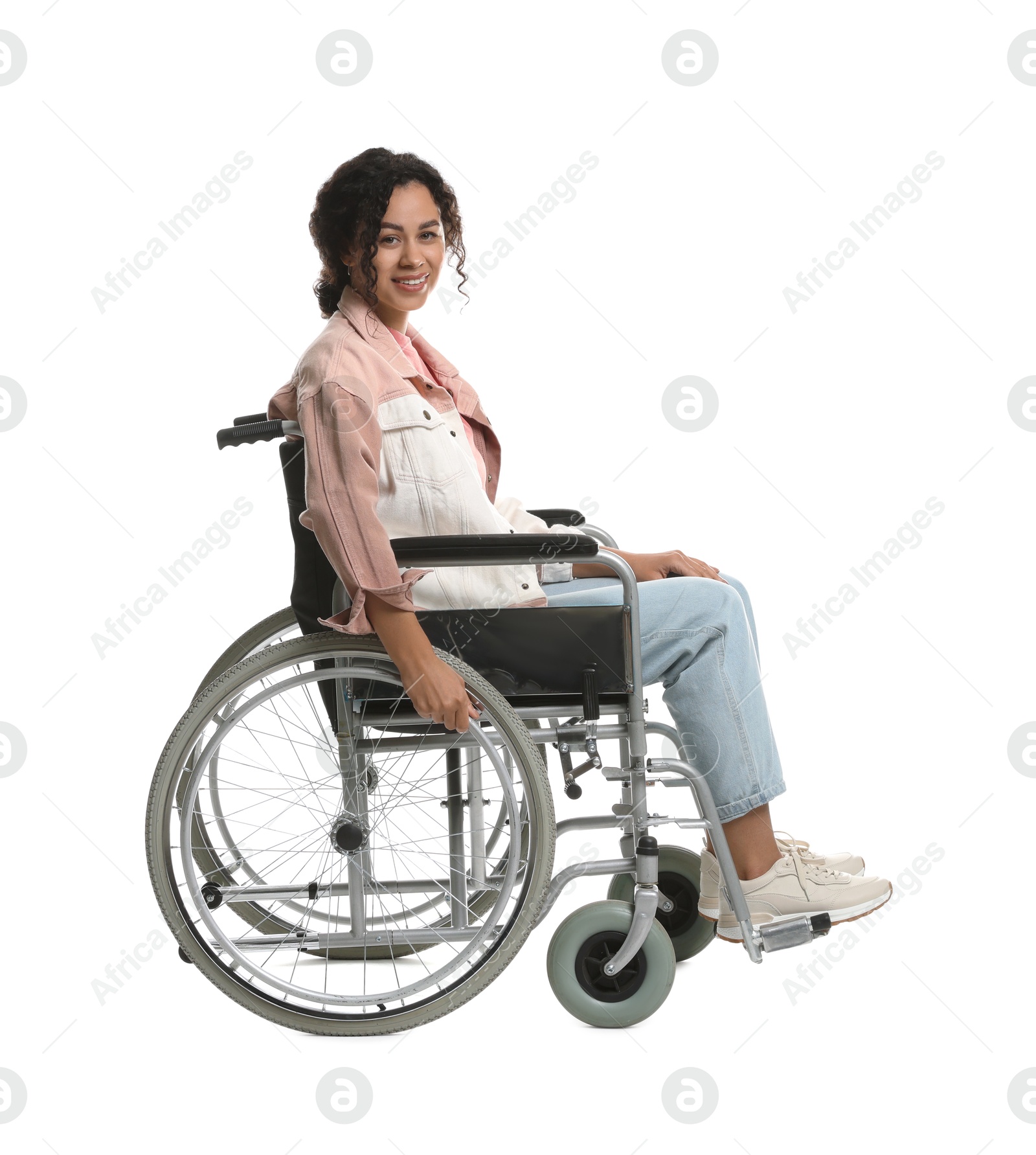 Photo of Smiling woman in wheelchair on white background