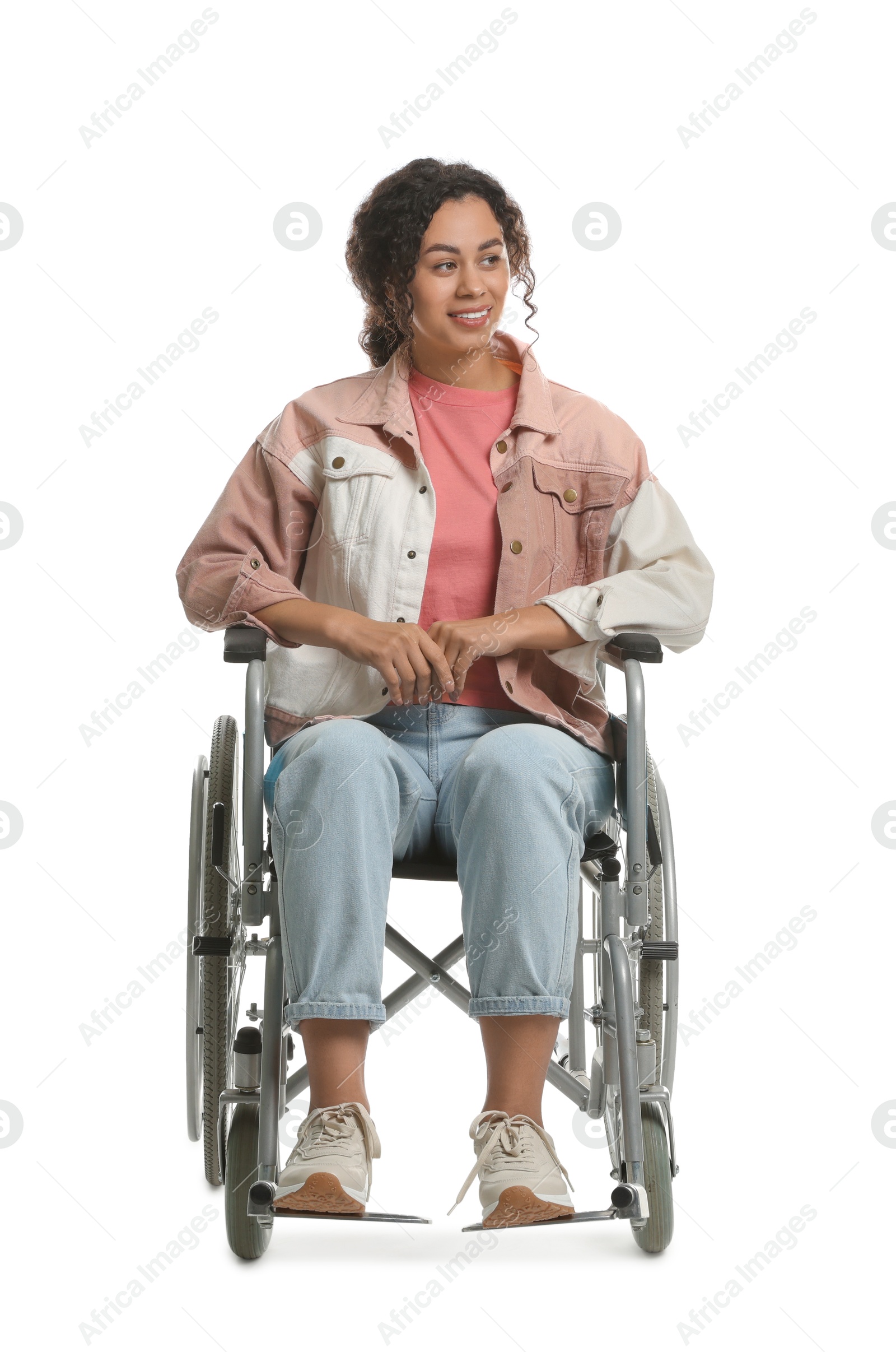 Photo of Smiling woman in wheelchair on white background