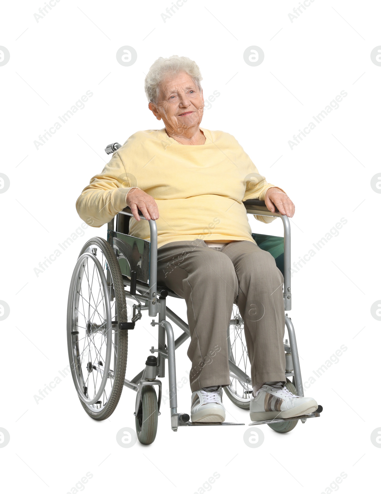 Photo of Elderly woman in wheelchair on white background