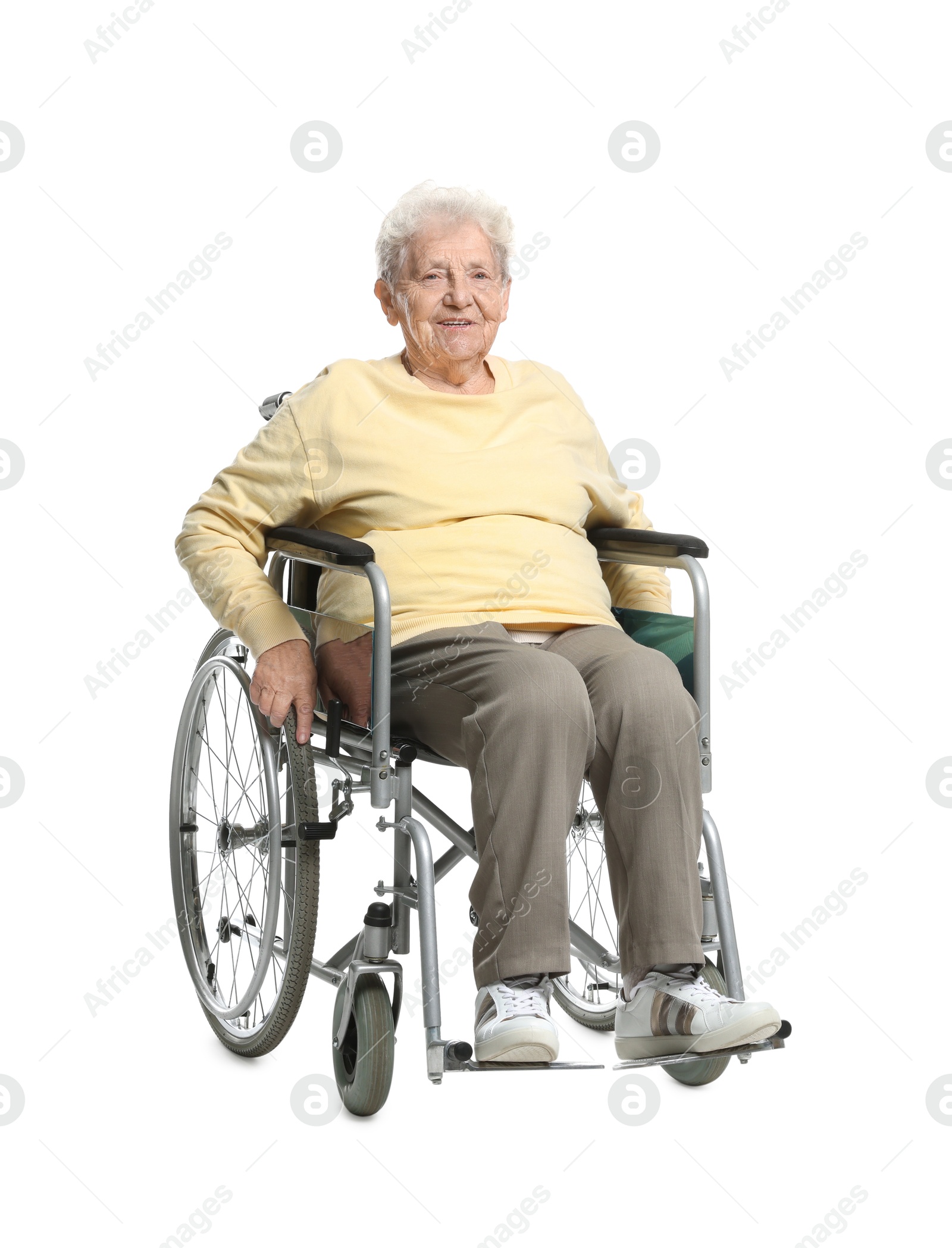 Photo of Elderly woman in wheelchair on white background