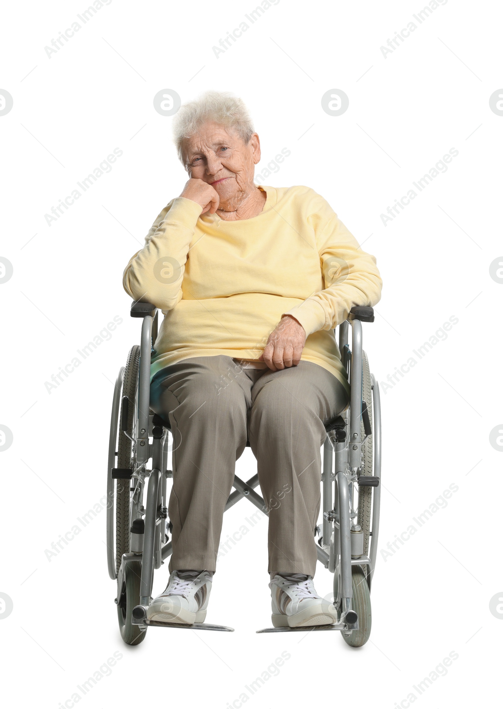 Photo of Elderly woman in wheelchair on white background