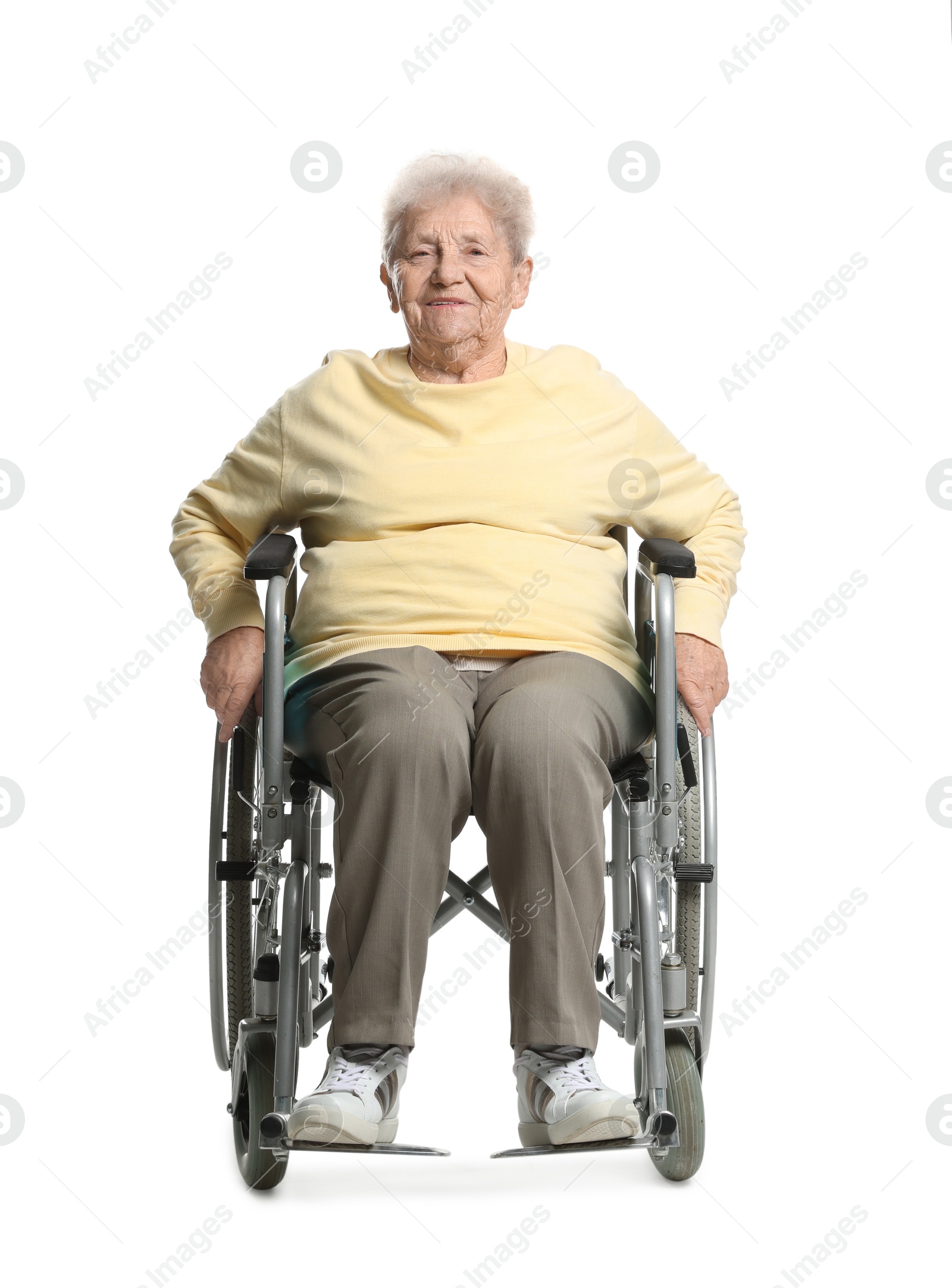 Photo of Elderly woman in wheelchair on white background