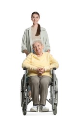 Photo of Caregiver with elderly woman in wheelchair on white background