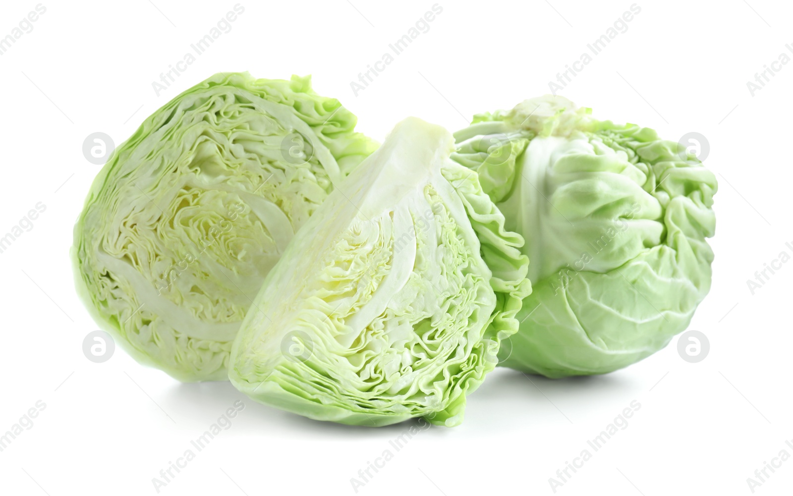 Photo of Whole and cut cabbages isolated on white