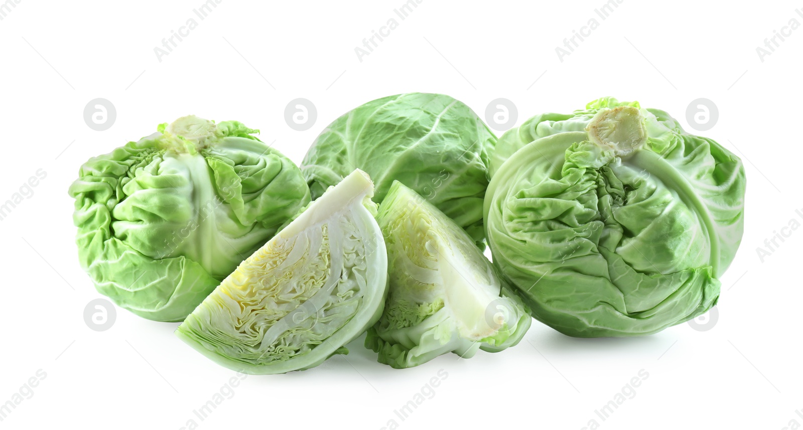 Photo of Whole and cut cabbages isolated on white