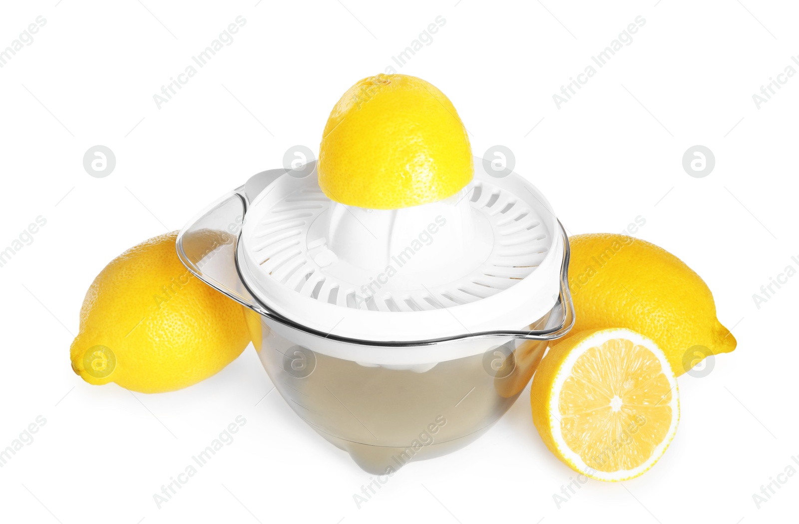 Photo of Juicer and fresh lemons isolated on white