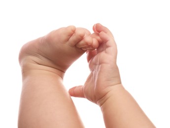 Photo of Little baby on white background, closeup view