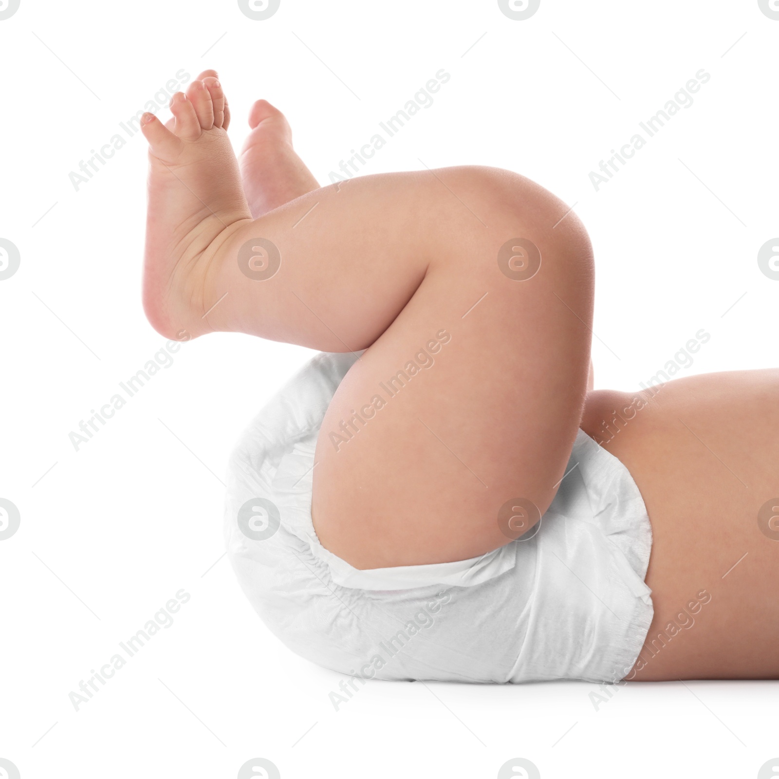 Photo of Little baby in diaper on white background, closeup