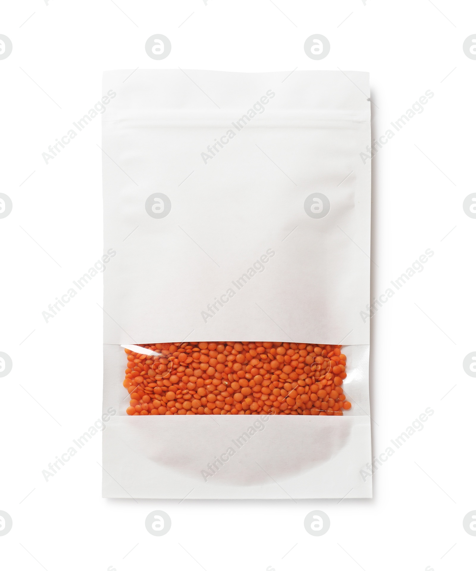 Photo of Paper pouch bag with lentil isolated on white, top view