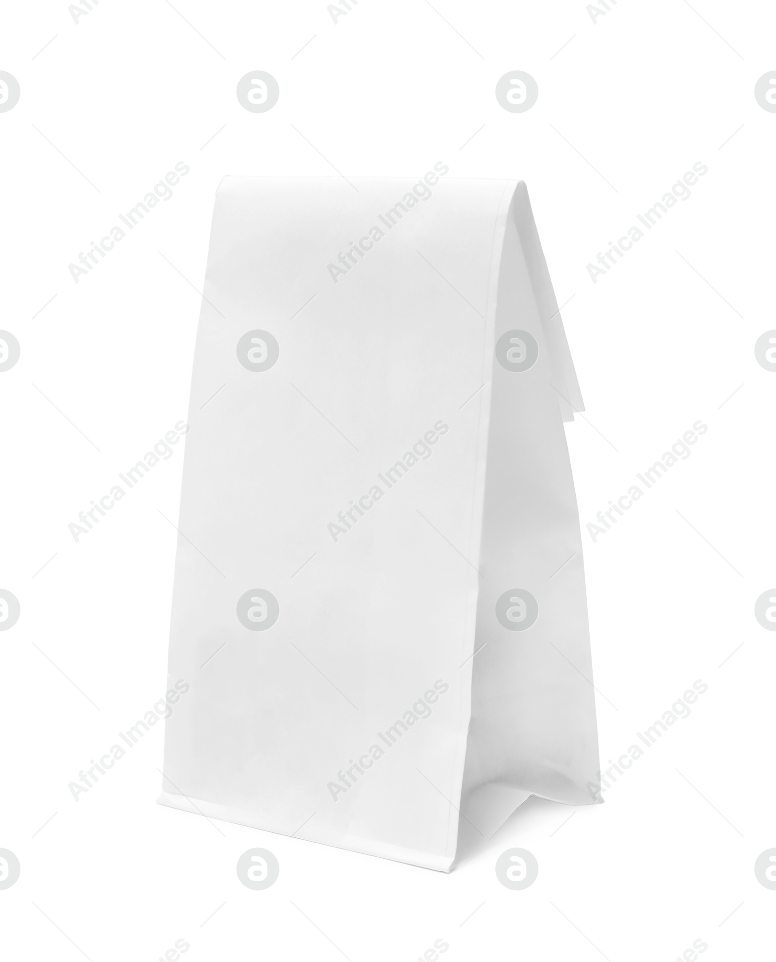 Photo of One closed paper bag isolated on white