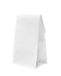 Photo of One closed paper bag isolated on white