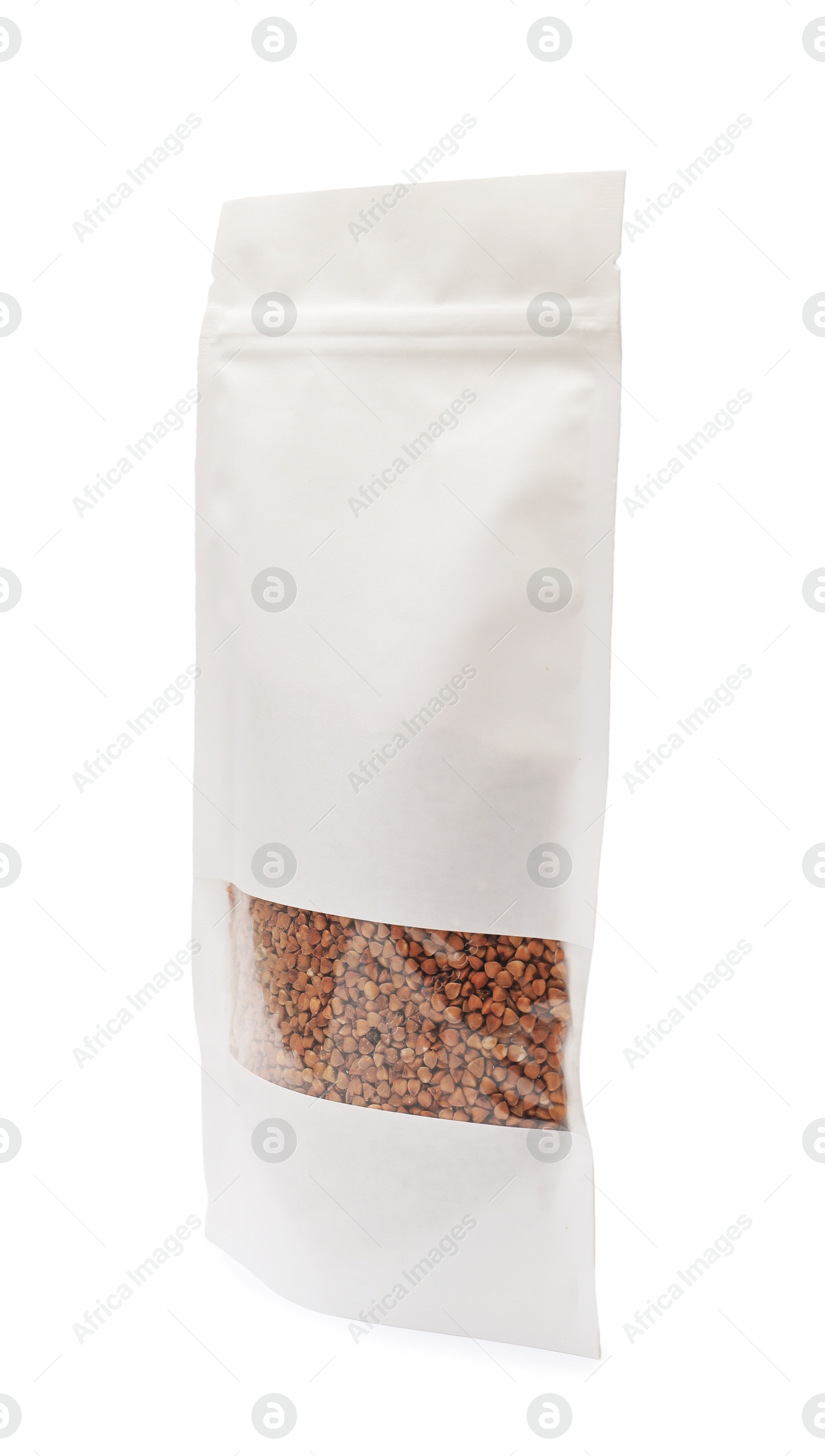 Photo of Paper pouch bag with buckwheat isolated on white