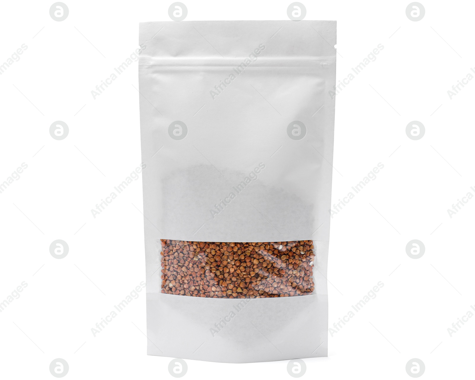 Photo of Paper pouch bag with buckwheat isolated on white