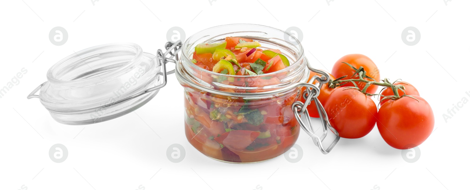 Photo of Tasty salsa sauce in glass jar and tomatoes isolated on white