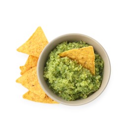 Photo of Delicious homemade green salsa with nachos isolated on white, top view