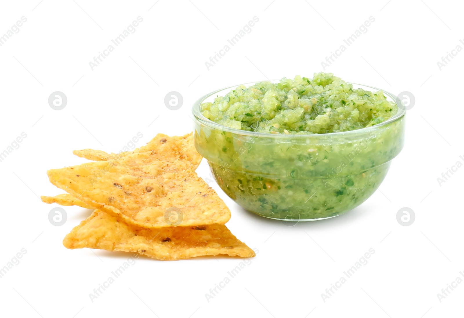 Photo of Delicious homemade green salsa with nachos isolated on white