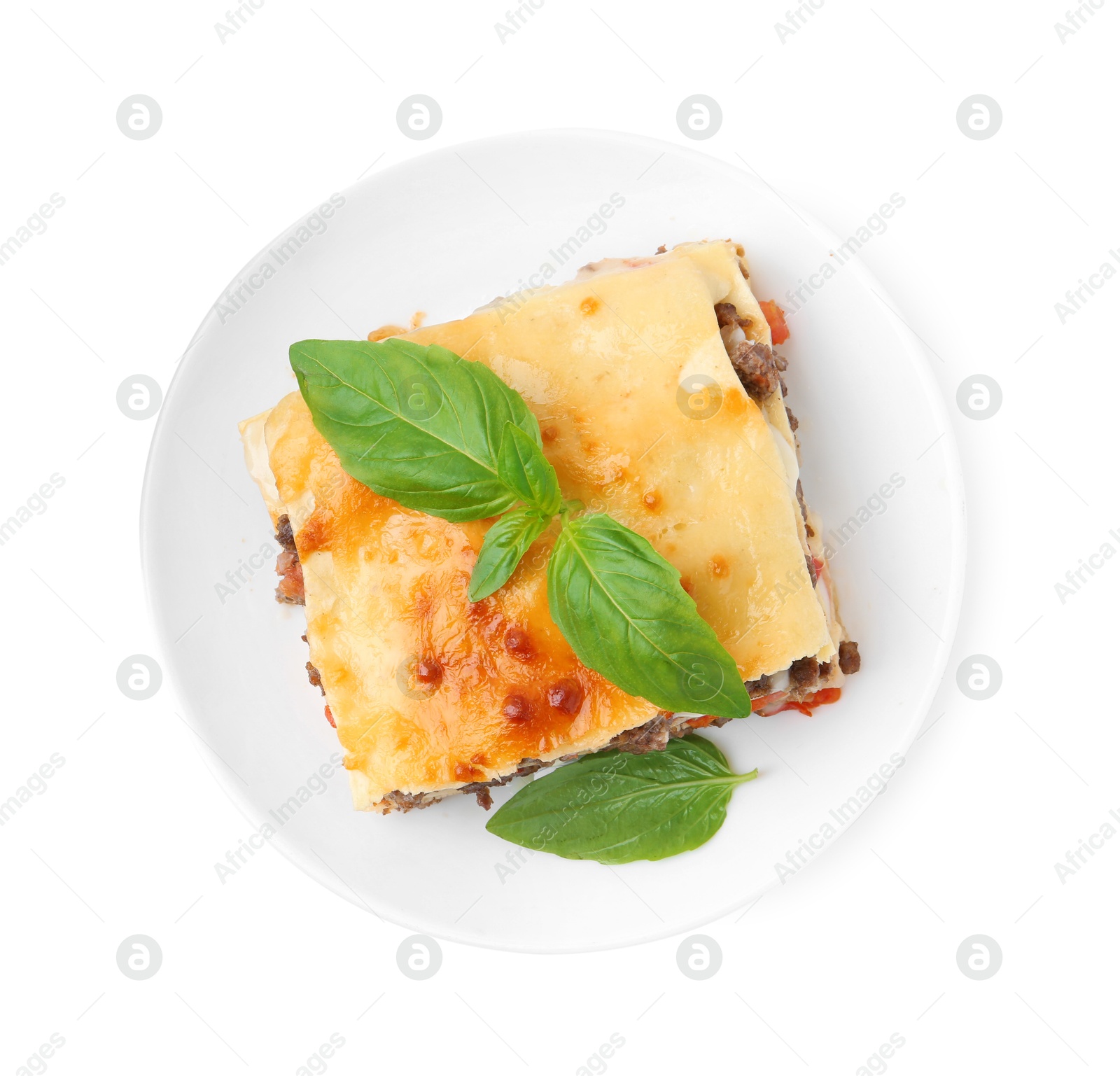 Photo of Delicious cooked lasagna with basil isolated on white, top view