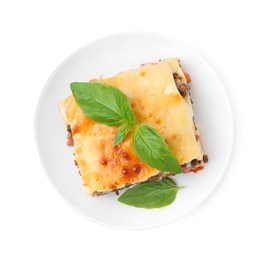 Photo of Delicious cooked lasagna with basil isolated on white, top view