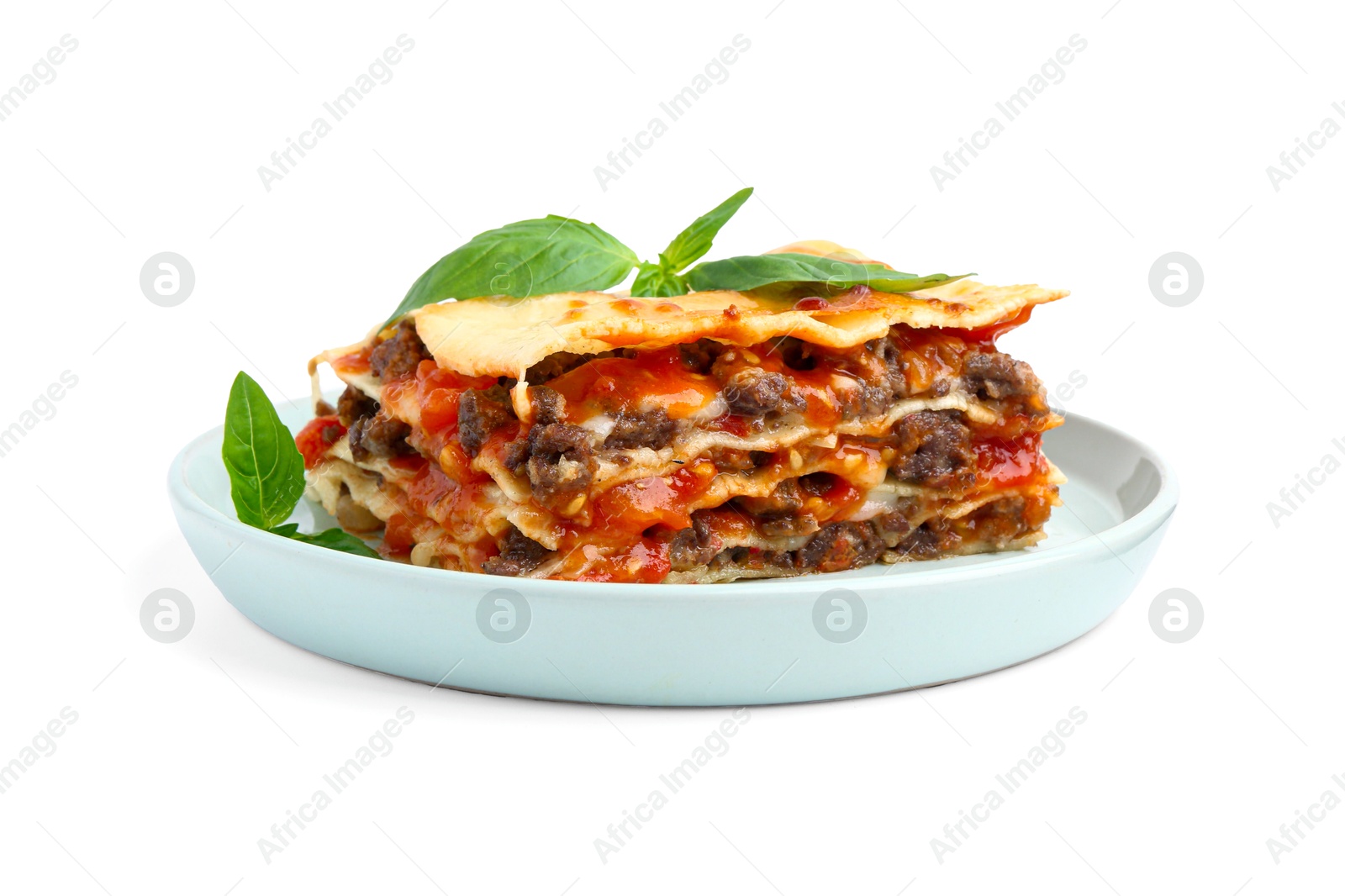 Photo of Delicious cooked lasagna with basil isolated on white