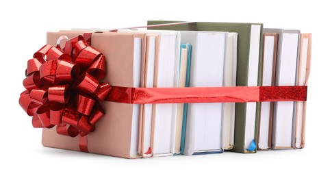 Photo of Books with red bow as gift isolated on white