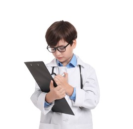 Photo of Boy with stethoscope and clipboard pretending to be doctor on white background. Dreaming of future profession