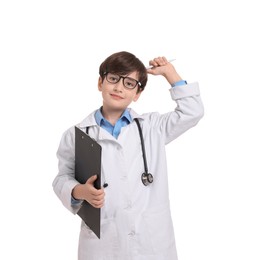 Photo of Boy with stethoscope and clipboard pretending to be doctor on white background. Dreaming of future profession