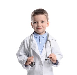 Photo of Little boy with stethoscope pretending to be doctor on white background. Dreaming of future profession