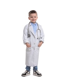 Photo of Little boy with stethoscope pretending to be doctor on white background. Dreaming of future profession