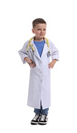 Photo of Little boy with stethoscope pretending to be doctor on white background. Dreaming of future profession