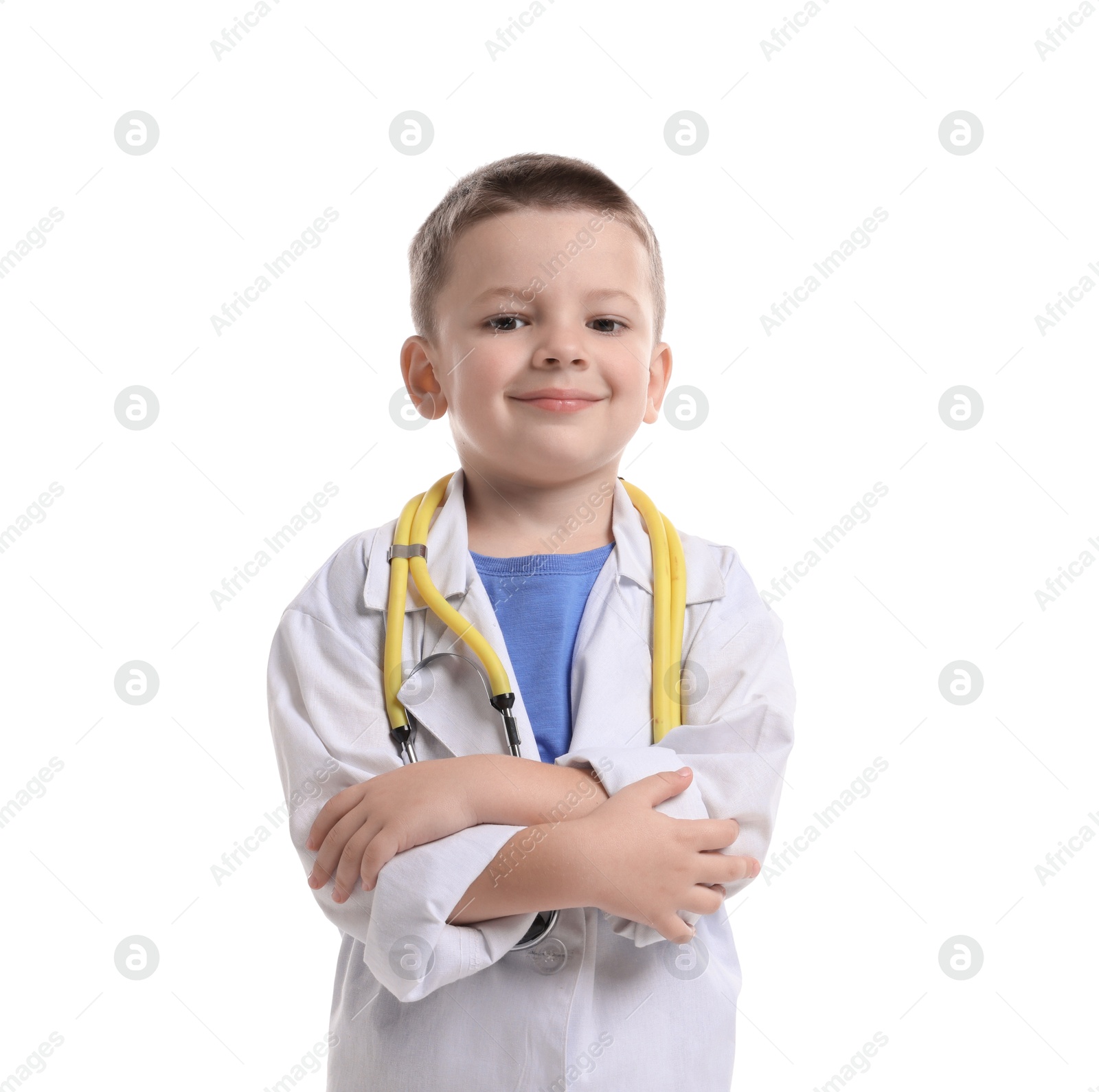 Photo of Little boy with stethoscope pretending to be doctor on white background. Dreaming of future profession