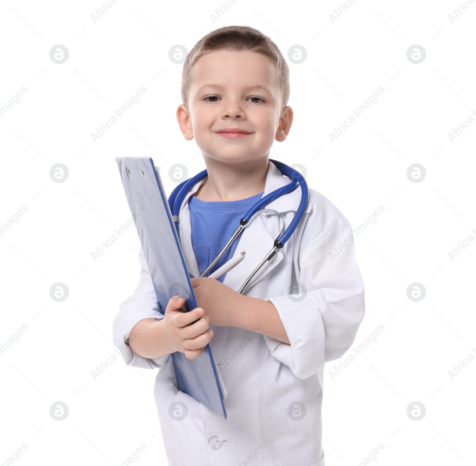 Photo of Little boy with stethoscope and clipboard pretending to be doctor on white background. Dreaming of future profession