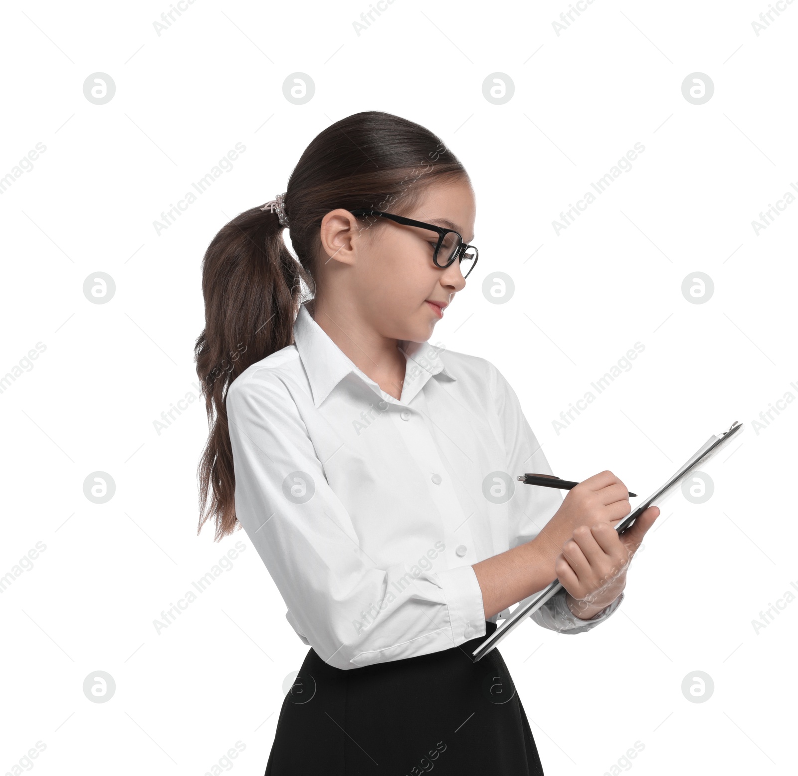 Photo of Girl with glasses and clipboard pretending to be accountant on white background. Dreaming of future profession