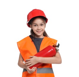 Photo of Girl with hardhat, fire extinguisher and vest pretending to be firefighter on white background. Dreaming of future profession