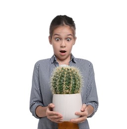 Photo of Emotional girl with potted cactus pretending to be gardener on white background. Dreaming of future profession