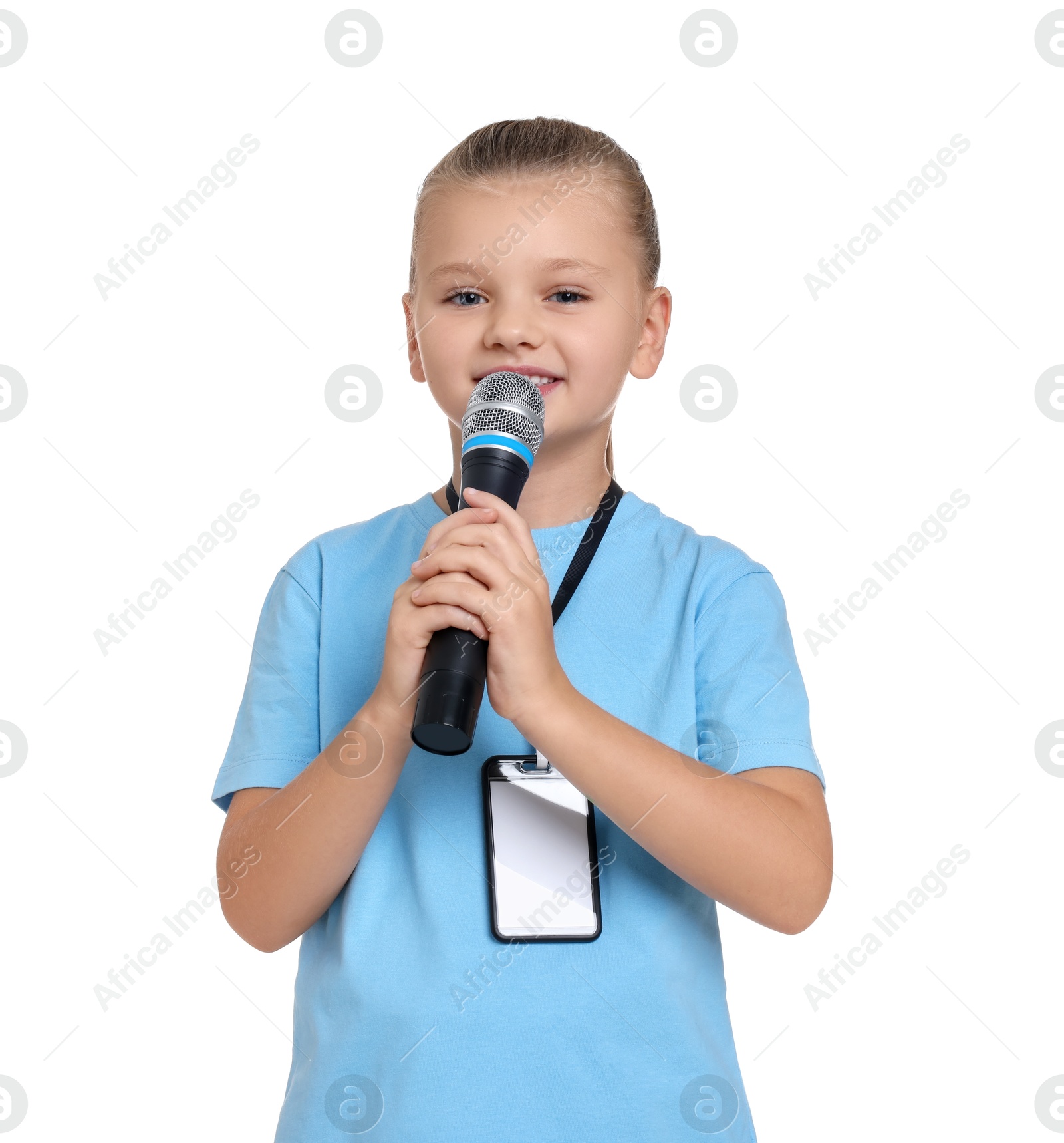 Photo of Little girl with microphone pretending to be journalist on white background. Dreaming of future profession